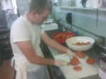 chopping tomatoes @ Mid West food night @ St John Vianney College Seminary, Miami, FL
